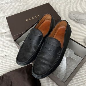 Black leather Gucci loafers